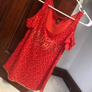 Off the shoulders Sinful shirt